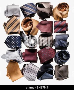 Variety of Colorful Neckties in Rolls, Studio Shot Stock Photo