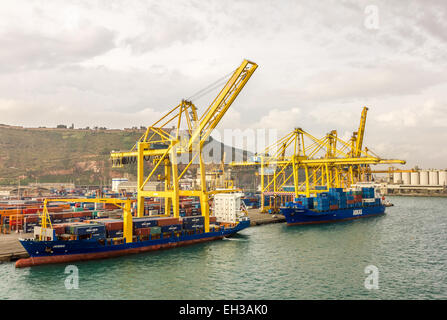 Container ships Janina and Ancangelo with loading cranes at the Port of Barcelona ( Port de Barcelona, Puerto de Barcelona), Stock Photo