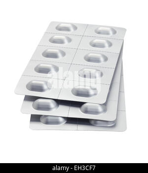Stack Of Medicine In Blister Packs On White Background Stock Photo