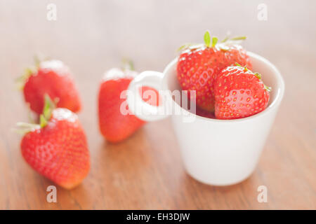 Fresh strawberries on wooden table, stock photo Stock Photo