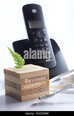 Black telephone with 3d puzzle and network cable in conceptual setting Stock Photo