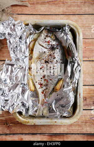 Dorado with lemon  roasted  in foil, food Stock Photo