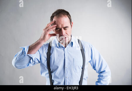 Man having a headache Stock Photo