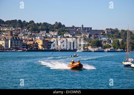 Dart Inshore Lifeboat 'Spirit of the Dart' passing Dartmouth on the River Dart at speed, Devon, England, UK Stock Photo