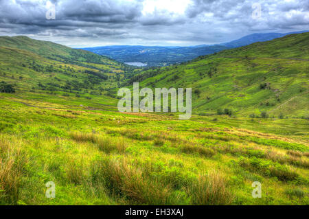 Kirkstone Pass view towards Grasmere by Kirkstone Pass Inn Lake District England UK with countryside in HDR Stock Photo