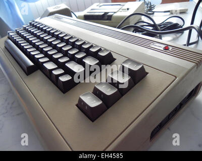 The history of home computers passes inevitably for the Commodore 64 that did play the kids Stock Photo