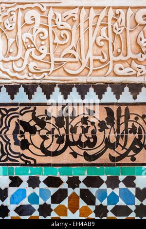 Morocco, High Atlas, Marrakech, imperial city, medina listed as World Heritage by UNESCO, madrasah (Islamic school) Ben Youssef, it was built around 1570 by the Saadian and restored in 1950, zelliges and stucco calligraphy Stock Photo