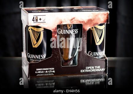 Four pack of Guinness draught beer cans Stock Photo