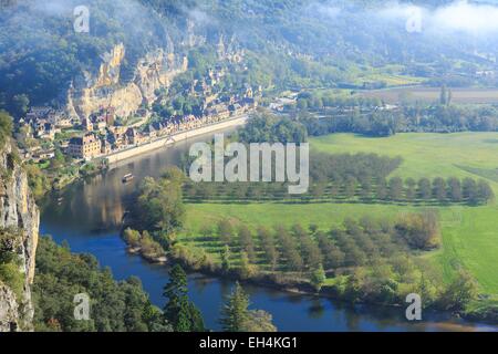 France, Dordogne, Perigord Noir, Dordogne Valley, Vezac, Marqueyssac castle, high angle view of the village of La Roque Gageac labelled Les Plus Beaux Villages de France (the Most Beautiful Villages of France) from the topiary gardens designed by one of L Stock Photo