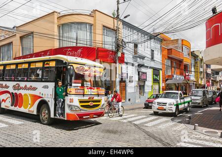 Ecuador, Imbabura, Atuntaqui, street scene and traffic at an intersection of a city Stock Photo