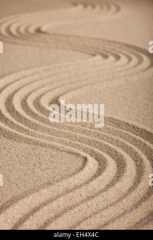 Zigzag on the sand stretching into the distance, as a background Stock Photo