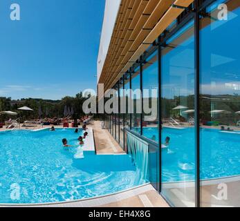 France, Alpes Maritimes, Valbonne, Sophia Antipolis, Garbejaire, people enjoying a swimming pool in summer Stock Photo