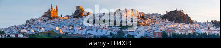 Spain, Andalusia, Cadix, Olvera, white village on a rocky promontory at sunrise Stock Photo