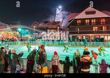 France, Haute-Savoie, Morzine, the valley of Aulps, ski slopes of the Portes du Soleil, ice rink place of Baraty with a view of the Pleney (1554m) Stock Photo