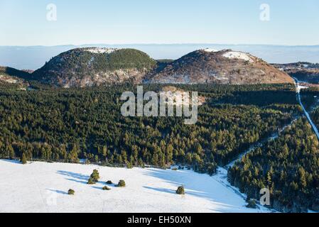 France, Puy de Dome, Orcines, the Chaine des Puys, the Grand Sarcoui and Puy des Goules volcanoes (aerial view) Stock Photo