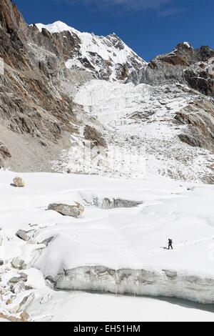 Nepal, Sagarmatha National Park, listed as World Heritage by UNESCO, Solu Khumbu District, climber crossing the Cho La glacier Stock Photo