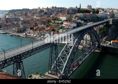 Portugal, North Region, Porto, historical center listed as World Heritage by UNESCO, the Eiffel style Dom Luis I bridge above the Douro River Stock Photo