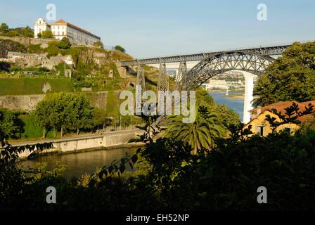 Portugal, North Region, Porto, historical center listed as World Heritage by UNESCO, the Eiffel bridge over the Douro River Stock Photo