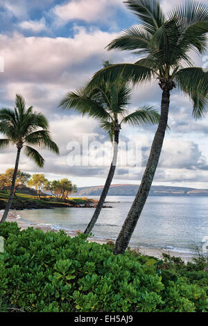 Morning sun and shadows on the offshore island of Kahoolawe from Makena Beach on Hawaii’s island of Maui. Stock Photo