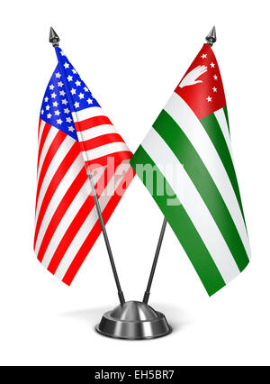 USA and Abkhazia - Miniature Flags Isolated on White Background. Stock Photo