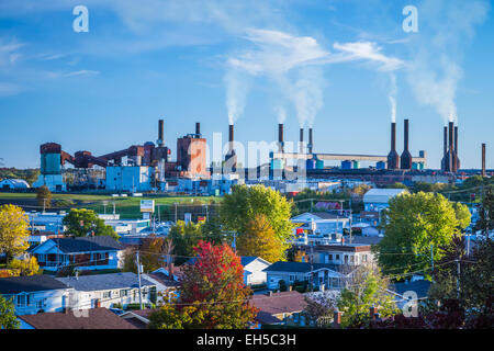 The city skyline, smoke stacks of the aluminum smelter and fall foliage color in Shawinigan, Quebec, Canada. Stock Photo