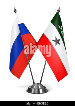 Russia and Somaliland - Miniature Flags Isolated on White Background. Stock Photo