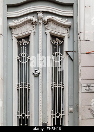 Argentina, Buenos Aires, Almagro, Gascon, tall belle epoque doorway decorative ironwork Stock Photo