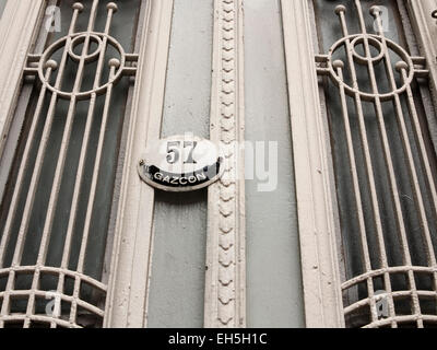Argentina, Buenos Aires, Almagro, Gascon, tall belle epoque doorway decorative ironwork Stock Photo