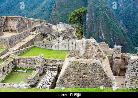 View of ancient ruined buildings at Machu Picchu, Peru Stock Photo