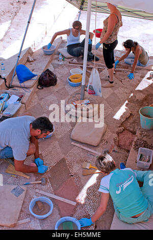 Archaeologists working in the ruins of ancient Messini, The Peloponnese, Greece Stock Photo