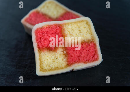 Closeup of two slices of Battenberg cake Stock Photo