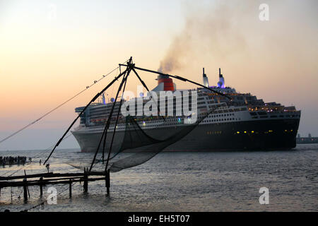Queen Mary 2 at Kochi. view from Fort Kochi at sunset. Stock Photo