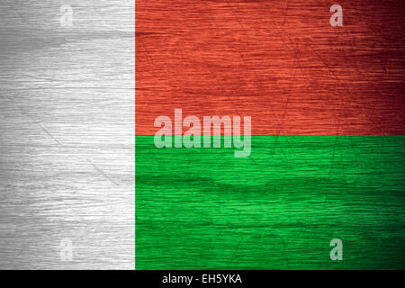 Madagascar flag or banner on wooden texture Stock Photo