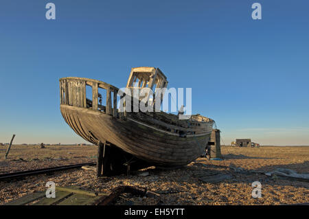 hdr image of an abondoned boat on a shingle beach using a combination of 7 images Stock Photo