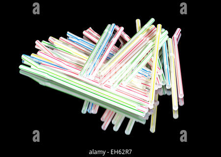Colored drinking straws thrown in a pile Stock Photo