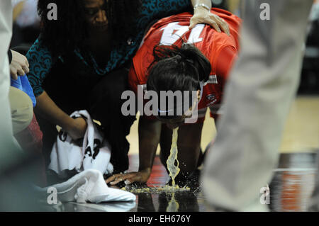 Hoffman Estates, IL, USA. 7th Mar, 2015. Ohio State Buckeyes guard Ameryst Alston (14) gets sick in the first half during the 2015 Big Ten Women's Basketball Tournament game between the Iowa Hawkeyes and the Ohio State Buckeyes at the Sears Centre in Hoffman Estates, IL. Patrick Gorski/CSM/Alamy Live News Stock Photo