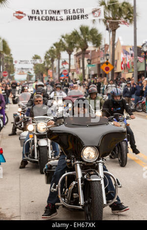 Bikers ride down Main Street during the 74th Annual Daytona Bike Week March 7, 2015 in Daytona Beach, Florida. Stock Photo
