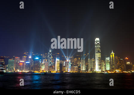 Spectacular sound and light show on Hong Kong Harbour at night. Viewed from Tsim Sha Tsui promenade in Kowloon Stock Photo