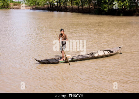 A man is riding in a canoe on the Mekong, Mekong Delta, Vietnam, Asia Stock Photo