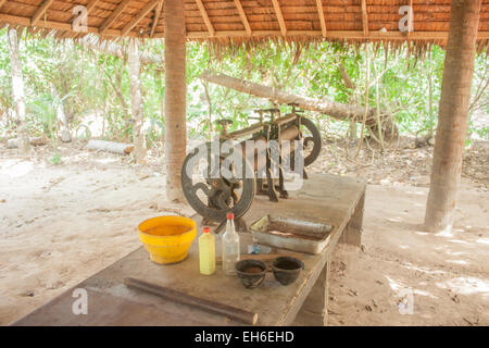 A mangle, used to mangle rubber from rubber trees. In koh samui, Thailand Stock Photo