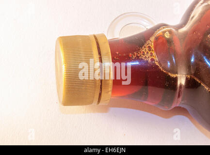 Brown maple syrup, isolated on white background Stock Photo