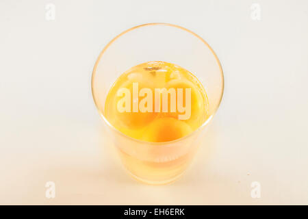 Eggs in a glas, isolated on white background Stock Photo