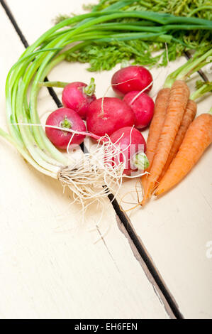 raw root vegetable on a rustic white wood table Stock Photo