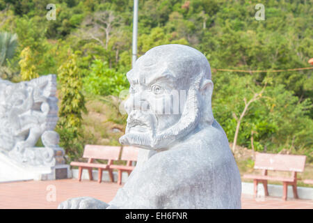 A stone statue, of a vietnamese old man Stock Photo
