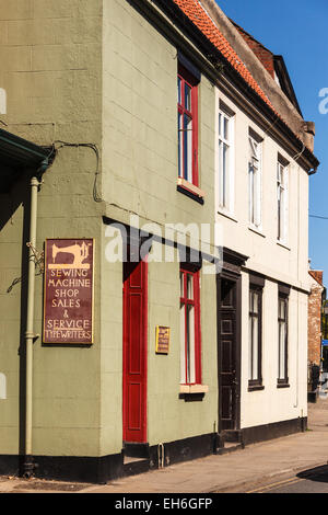 Old sewing machine shop in Bridlington, East Riding of Yorkshire, England. Stock Photo