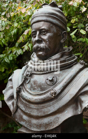 Statue of William Walker MVO (1869–1918)in the grounds of Winchester Cathedral: the diver 'who saved' Winchester Cathedral. UK. Stock Photo