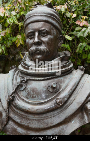 Statue of William Walker MVO (1869–1918)in the grounds of Winchester Cathedral: the diver 'who saved' Winchester Cathedral. UK. Stock Photo