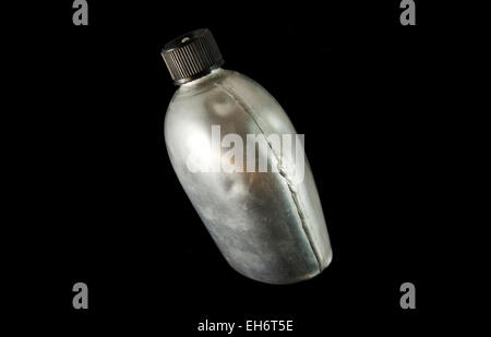 old canteen for water isolated on black Stock Photo