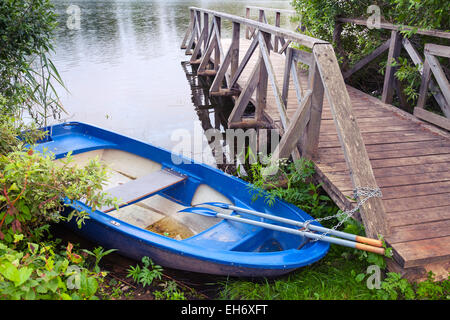 Small plastic fishing boat on a beach, Sri Lanka Stock Photo - Alamy