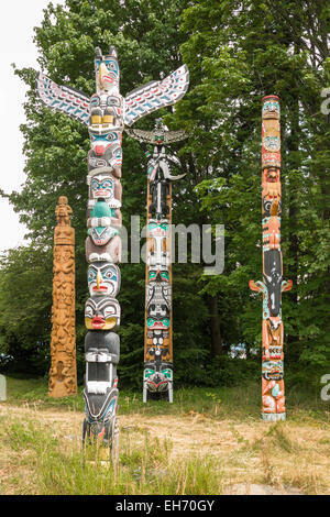 Totem poles near Brockton Point in Stanley Park, Vancouver, BC, Canada. Stock Photo